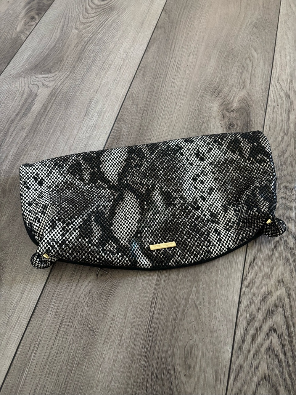BCBGMaxAzria Black and Gray Snake-Print Foldover Clutch with Gold Accent